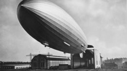 LZ-129, with no name painted on bow, leaves hangar for a test flight in March, 1936