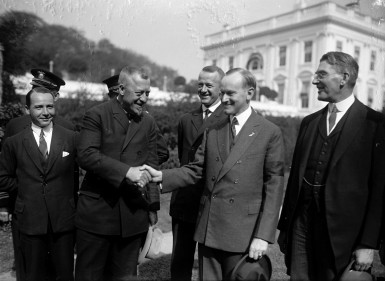 Hugo Eckener being greeted by U.S. President Calvin Coolidge after the successful transatlantic delivery flight of LZ-126.