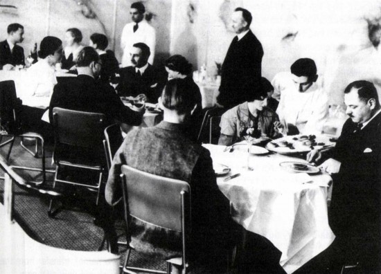 Heinrich Kubis (standing, dark jacket) in Dining Room of LZ-129 Hindenburg