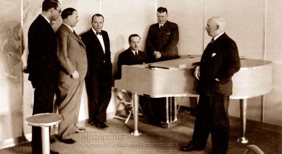 Franz Wagner at Hindenburg's Piano, with Dr. Rudolf BlÃ¼thner-Haessler to his left in the corner, and Captain Ernst Lehmann to his right.